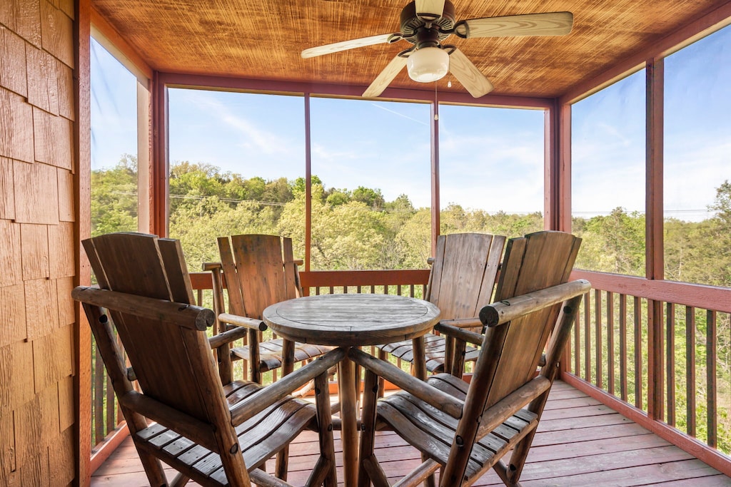Take in the serene wooded views from your private screened-in deck,