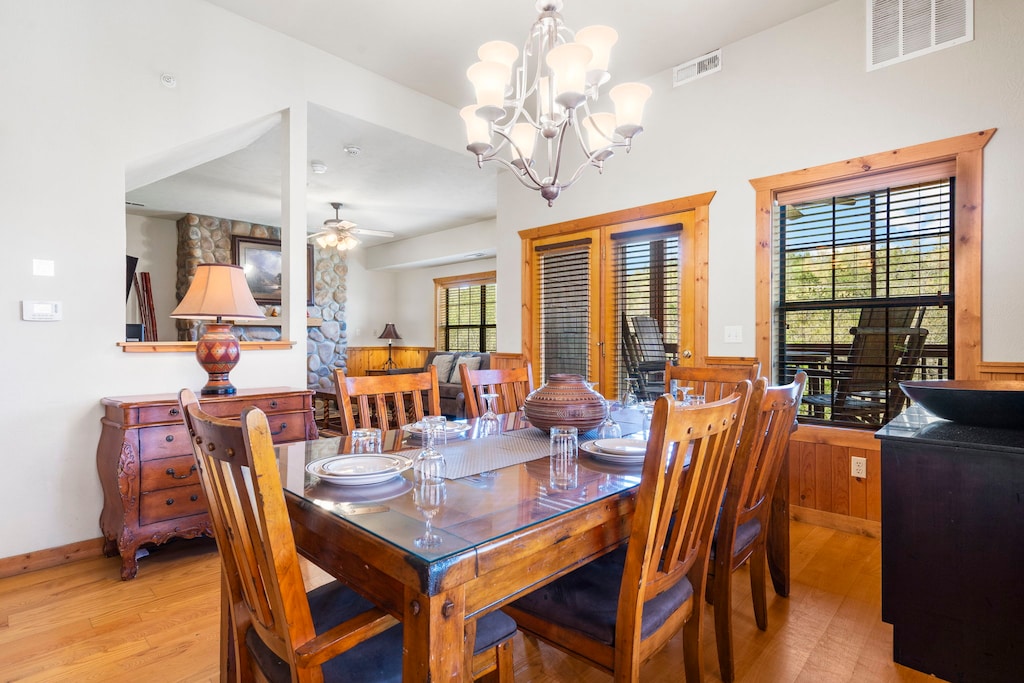 Gather around the spacious wooden dining table