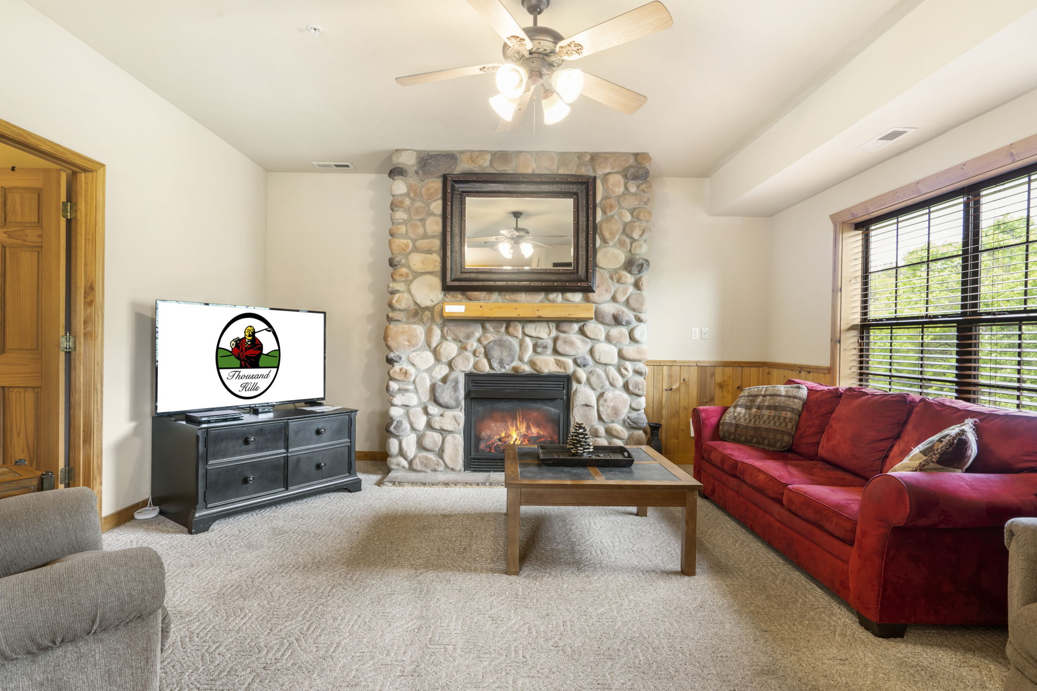 Living Room featuring Cable TV and Seasonal Gas Fireplace