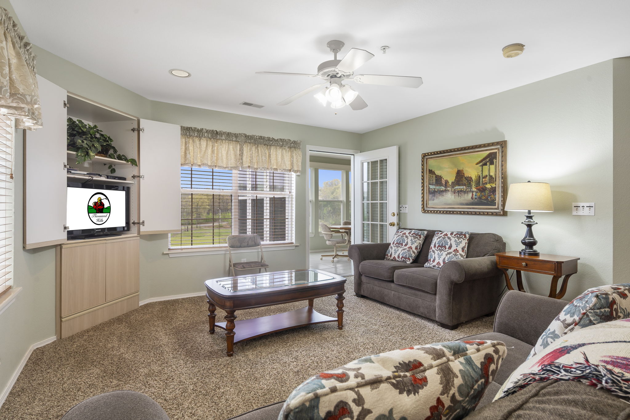 The Living Room features Sunroom Access, Cable TV/DVD, and a Sofa Bed