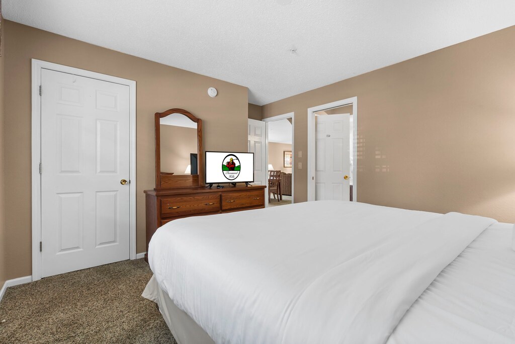 The guest bedroom features a king bed, cable TV, and an attached bathroom.