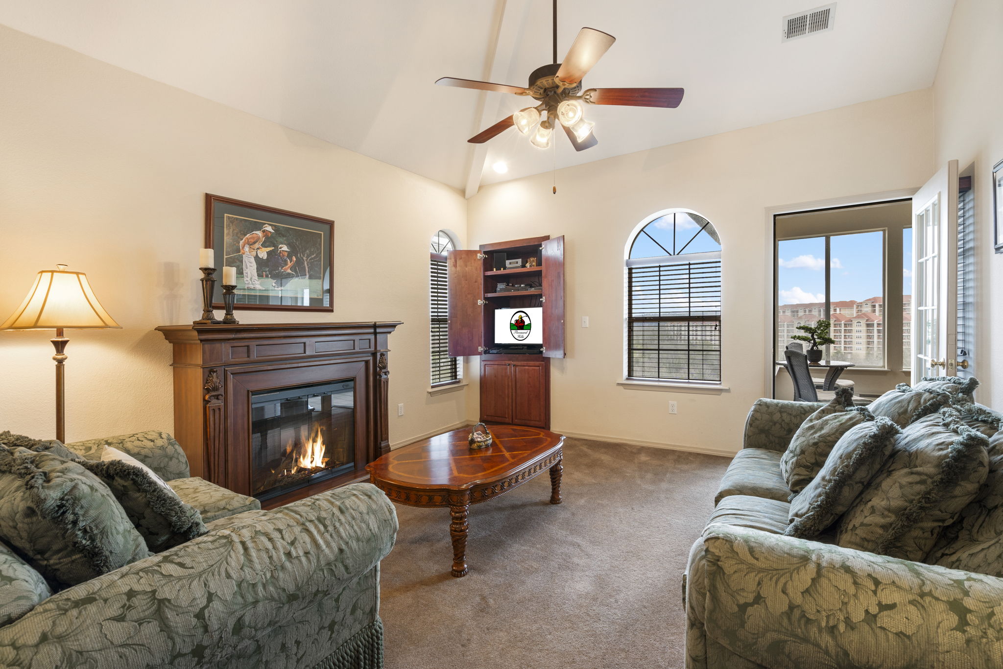 Living Room with Fireplace, Cable TV/DVD, Sofa Bed, and Sunroom Access