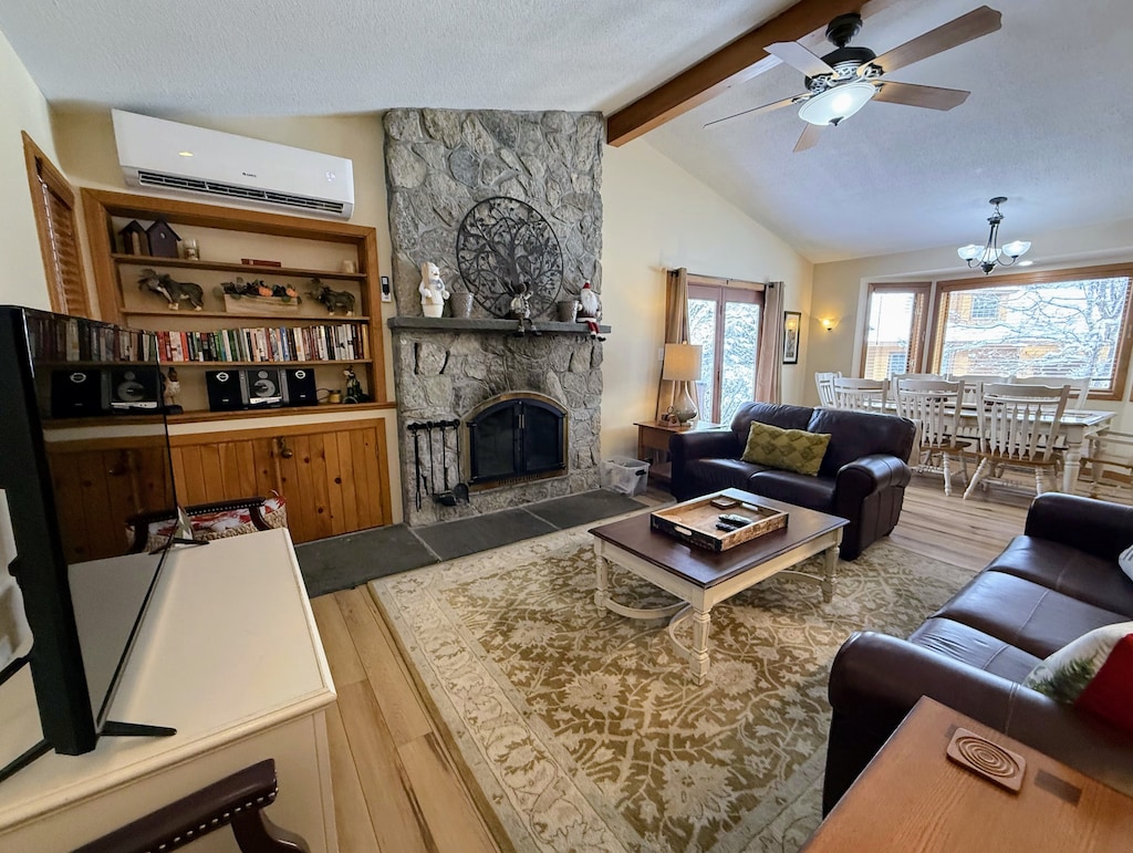 Dining/Living Area: Open concept space offers dining table with room for 8 and comfortable couches to relax by the stone fireplace. TV with high speed wi-fi included.