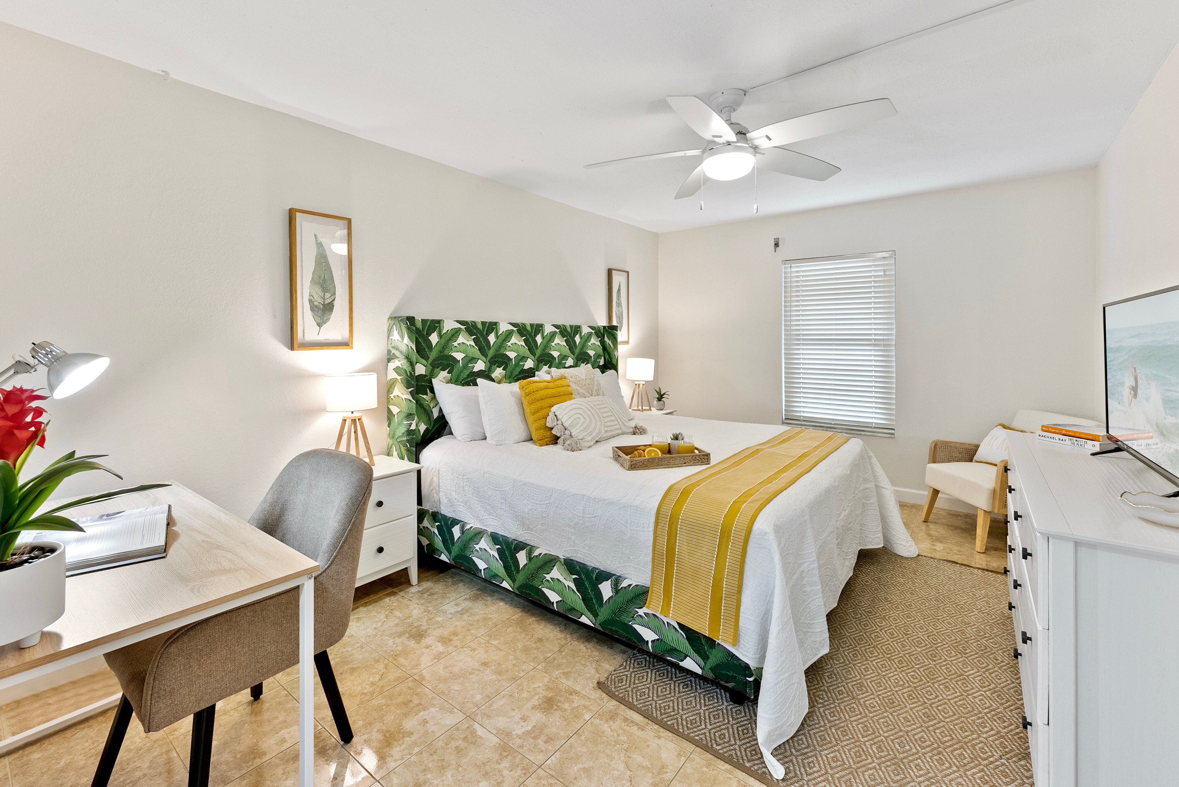 Master bedroom with a king bed and desk