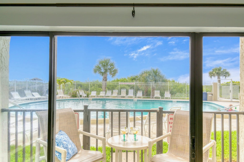 Walk right out your patio doors to the pool and beach!

Note: The patio enclosure was removed during the recent balcony restoration project. The patio is no longer gated.