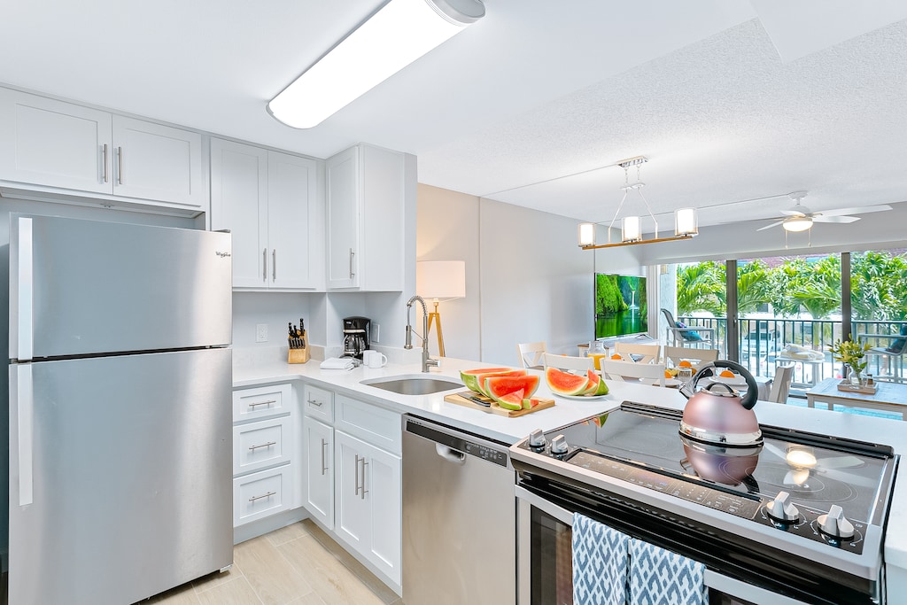 Sleek and modern kitchen with brand-new appliances and open layout