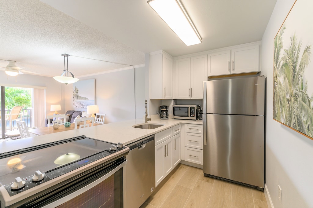 Modern kitchen with stainless steel appliances and ample counter space