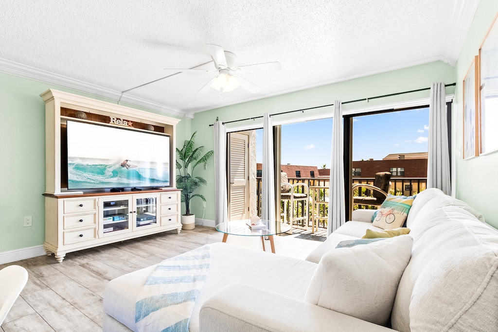 Cozy and inviting living area with a beautiful balcony view.