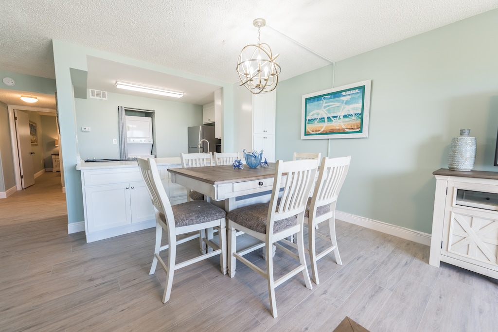 Enjoy a charming dining area with soft lighting and a welcoming ambiance