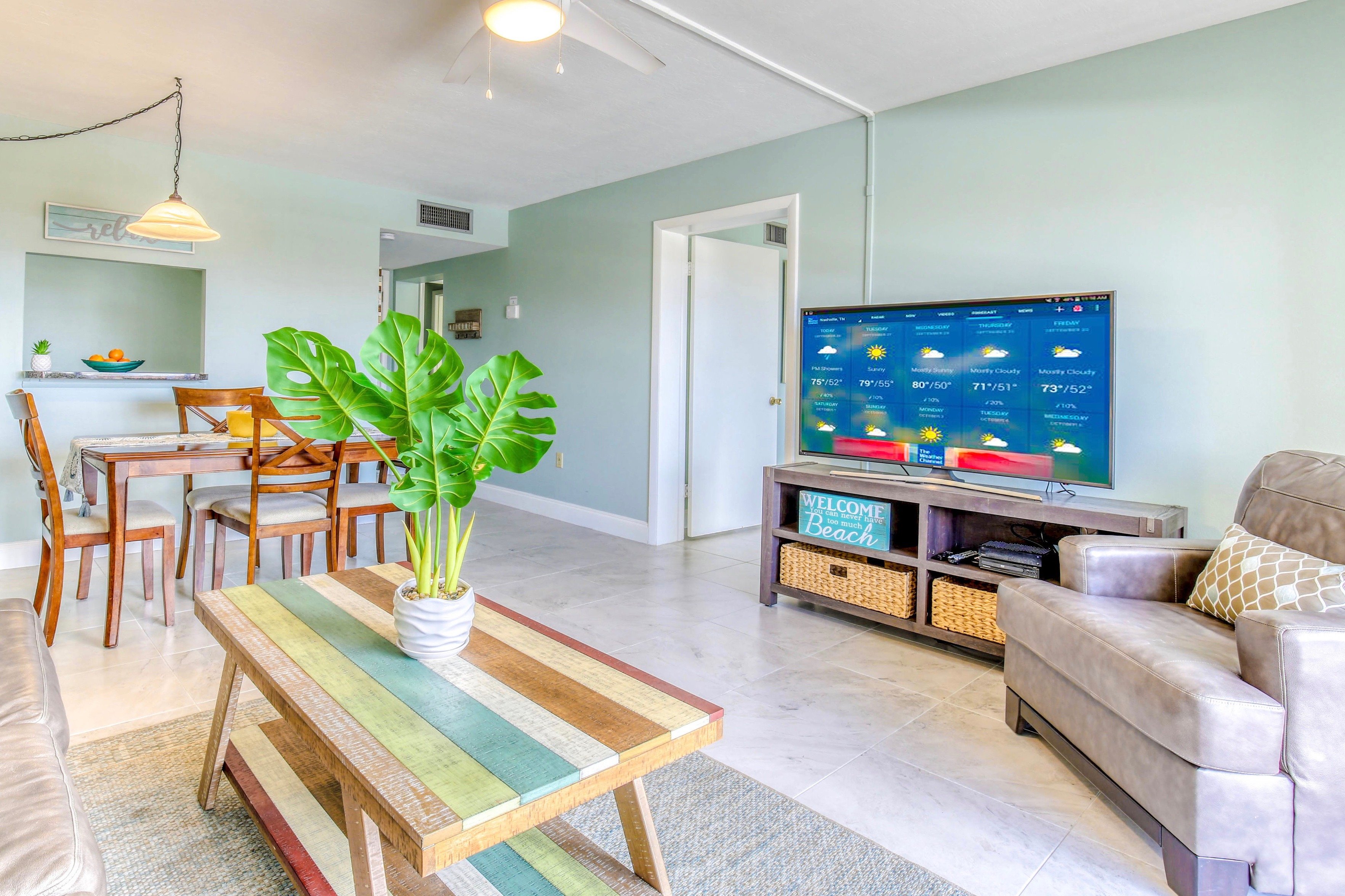 Bright and beachy living and dining area