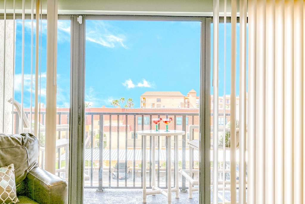 Sip a refreshing drink while soaking up the peaceful balcony views