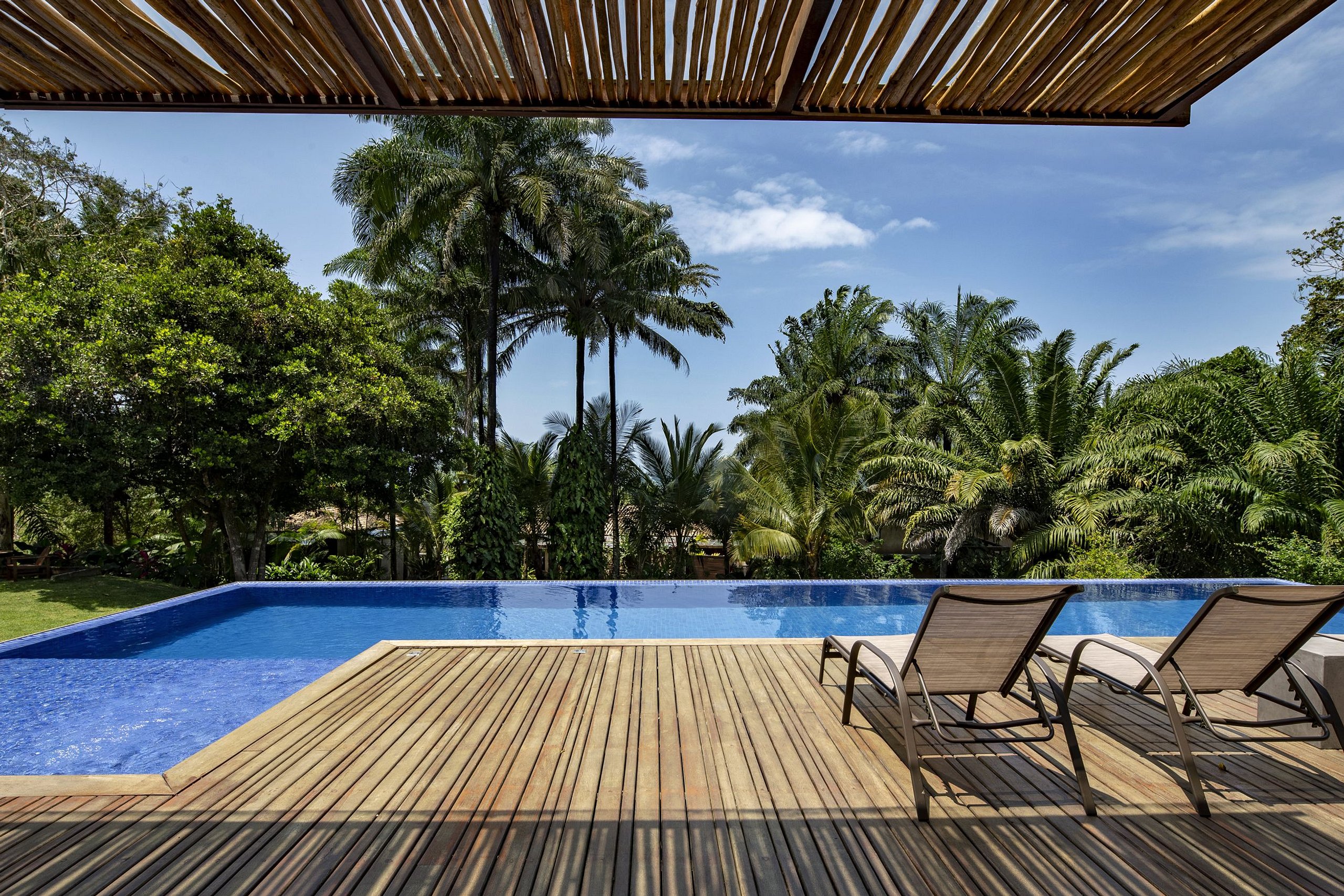 Impressive Wooden Stone Home with Sun Soaked Pool