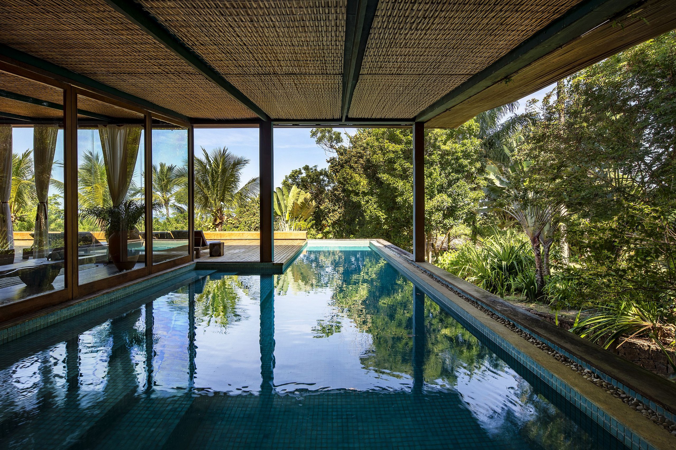 Marvelous Modern Glass Home with Stunning Shaded Pool