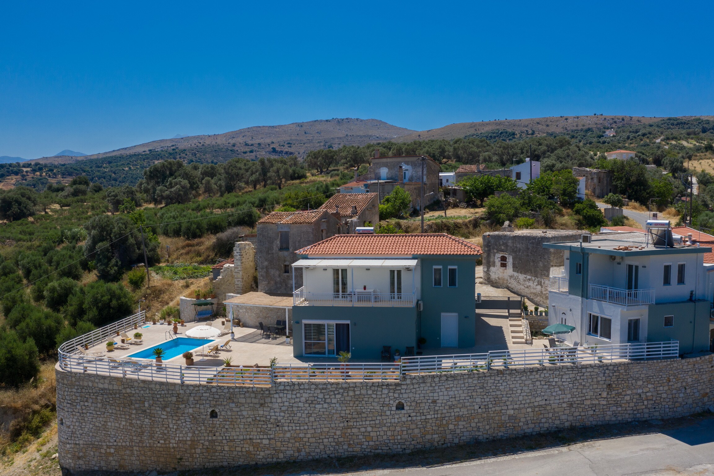 Main facade and the Swimming pool of Modern villa with unlimited sea views with private pool, Agia Triada, Rethymno,Crete Main facade and the Swimming pool of Modern villa with unlimited sea views with private pool, Agia Triada, Rethymno,Crete