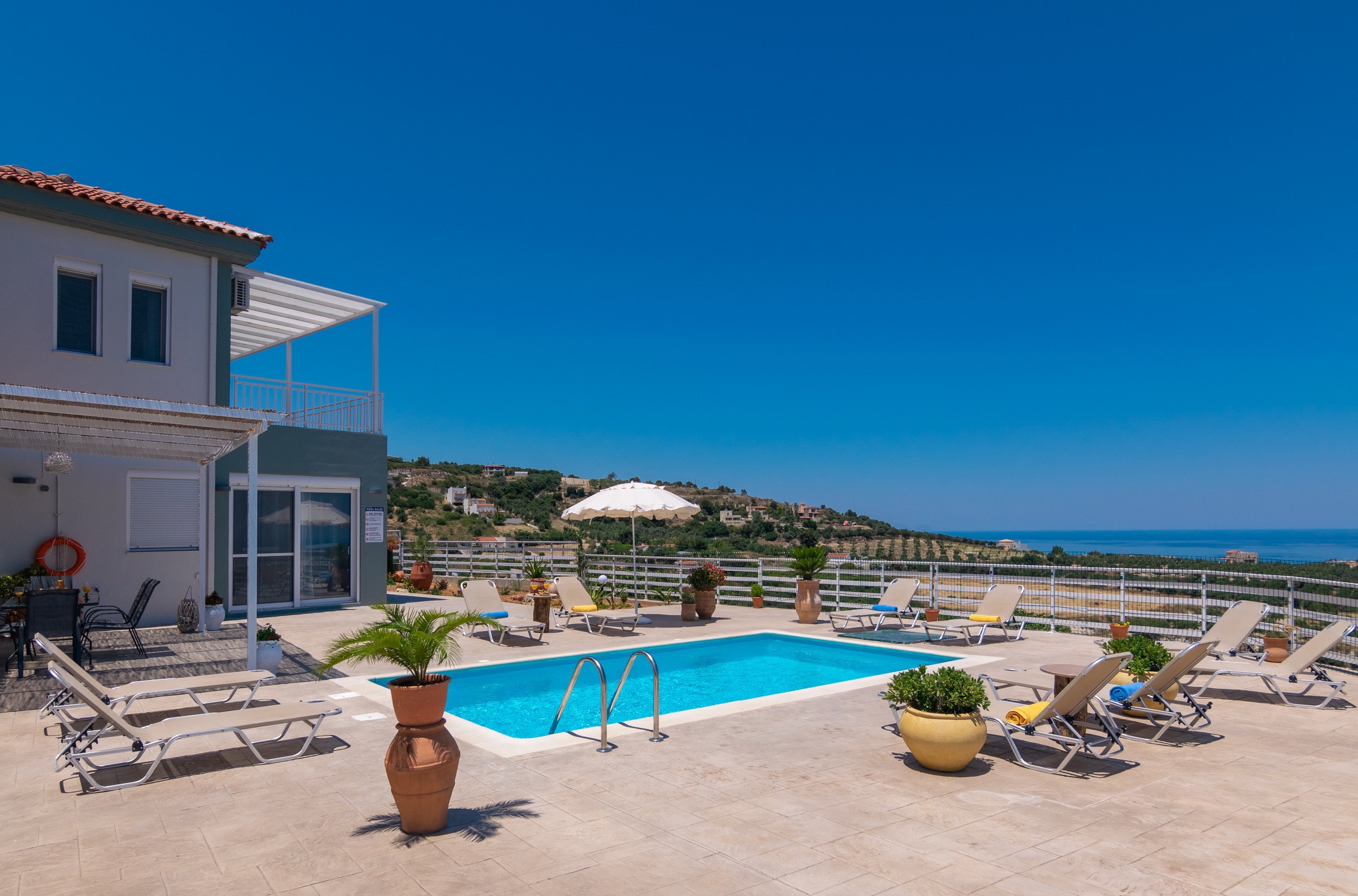 Main facade and the Swimming pool of Modern villa with unlimited sea views with private pool, Agia Triada, Rethymno,Crete Main facade and the Swimming pool of Modern villa with unlimited sea views with private pool, Agia Triada, Rethymno,Crete