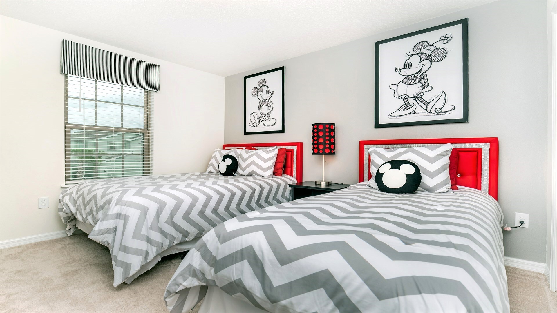 Kids will love the upstairs bedroom with a lovely Mickey theme
