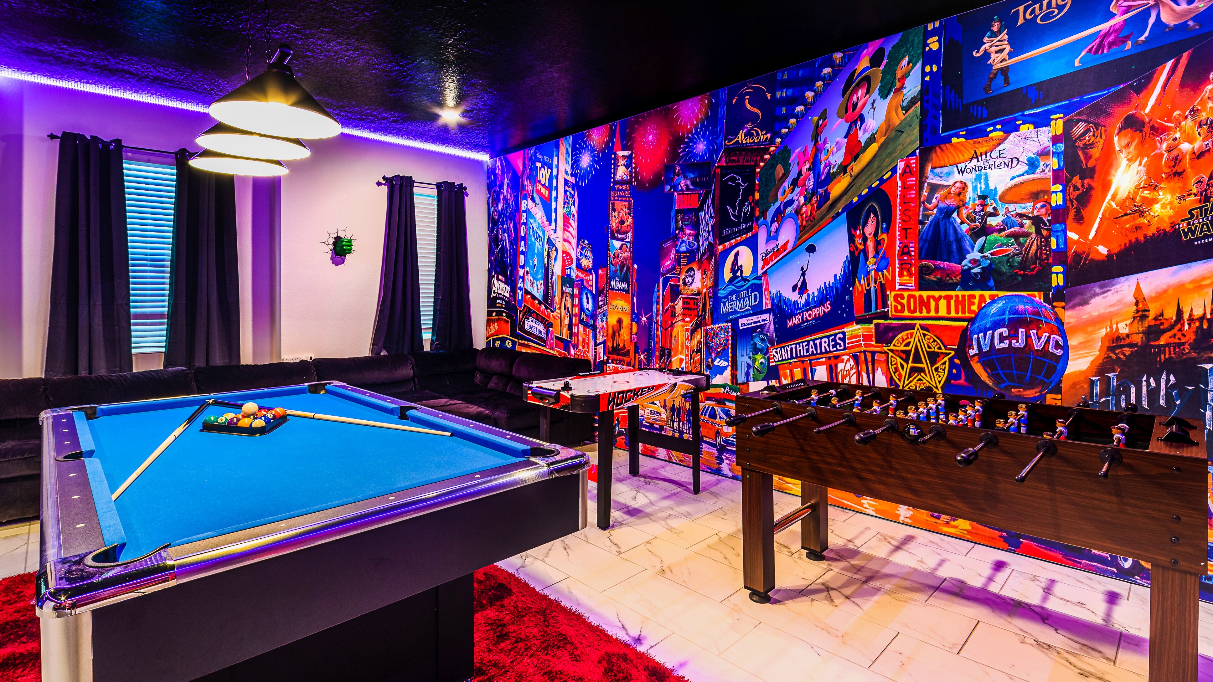 Transform your leisure space into a dynamic playroom with the inclusion of both a pool table and foosball, offering diverse gaming options.
