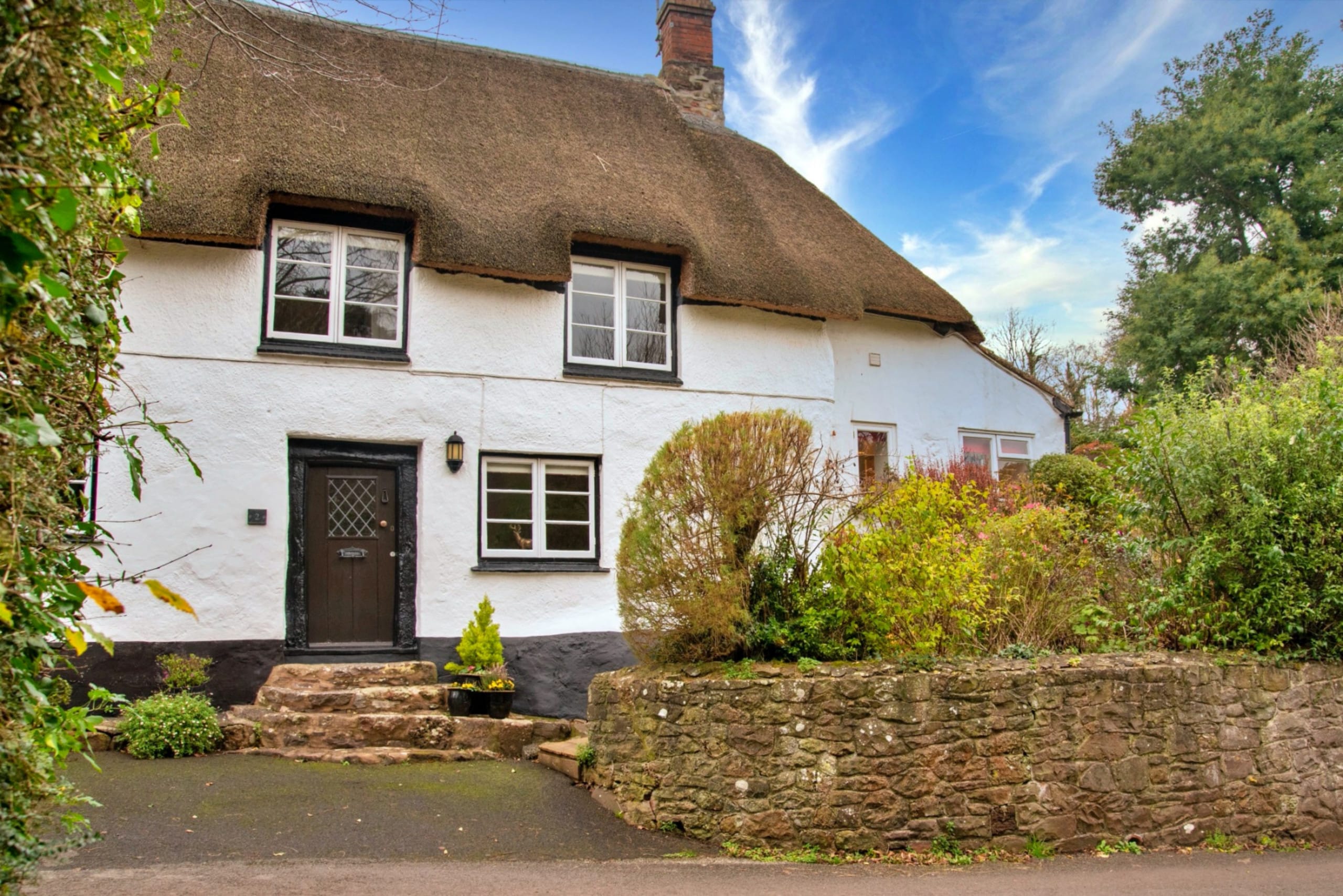Property Image 1 - Traditional Thatched Cottage with Sunny Terrace