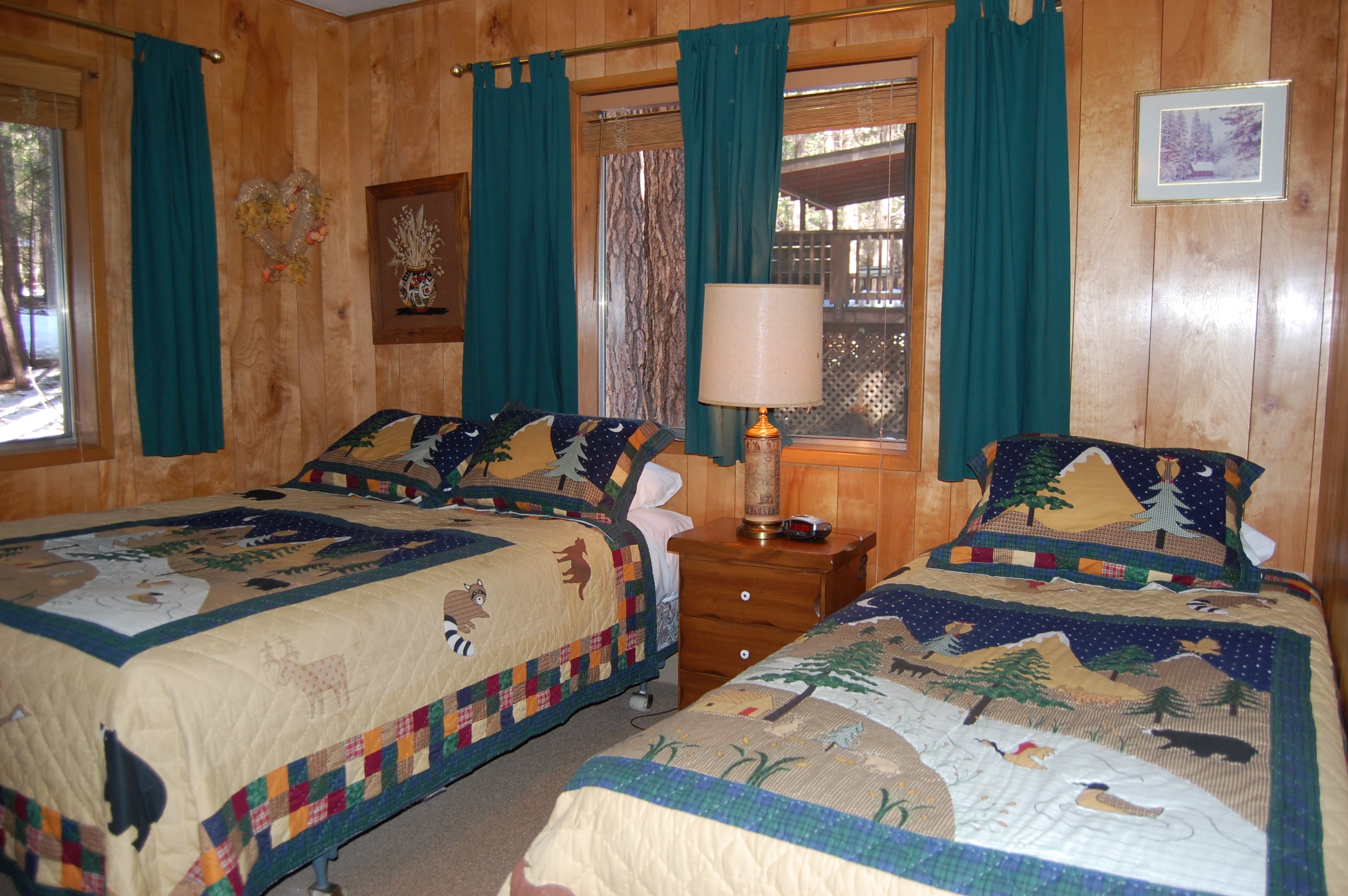 Bedroom 1 with a queen and twin beds