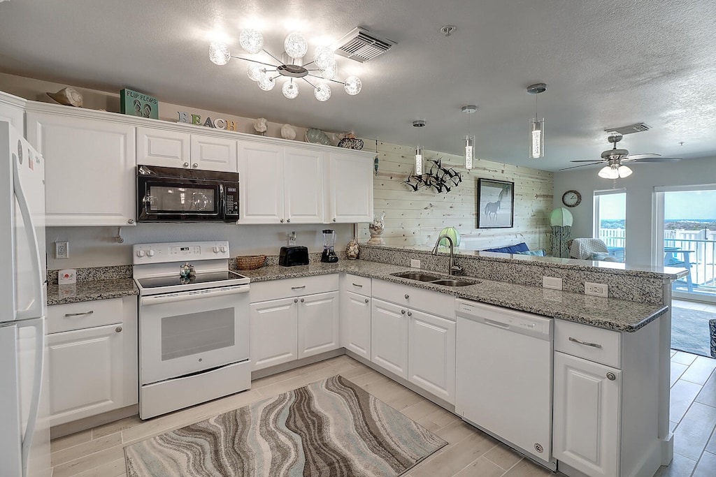 Kitchen. Full kitchen perfect for preparing your catch of the day! 