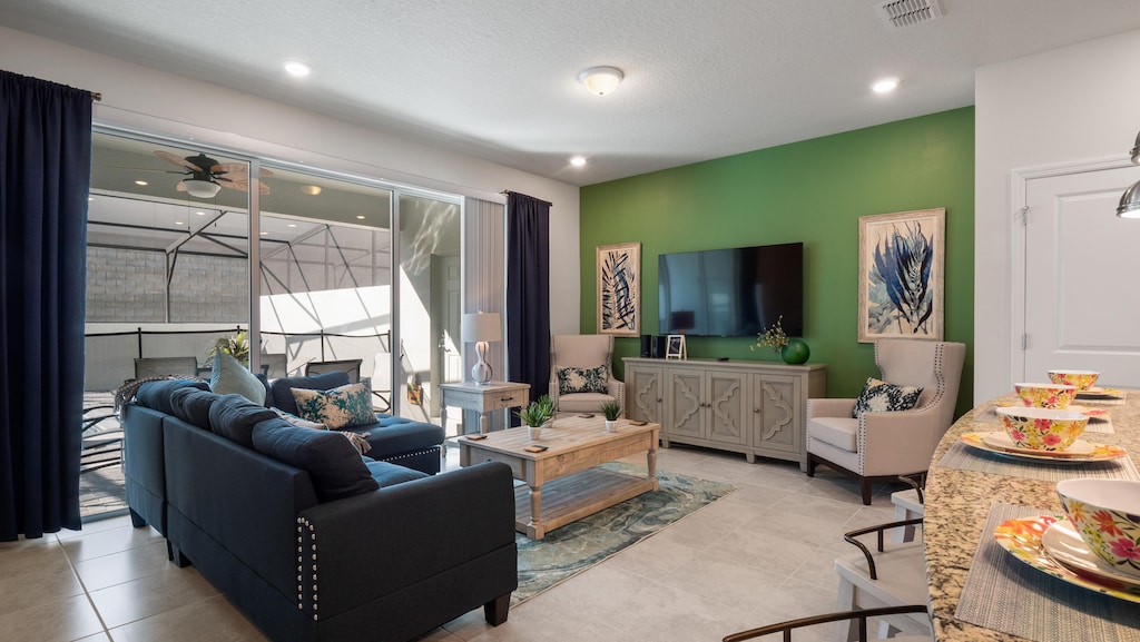 Spacious, modern living room — perfect for movie nights and family time after a day at Disney!