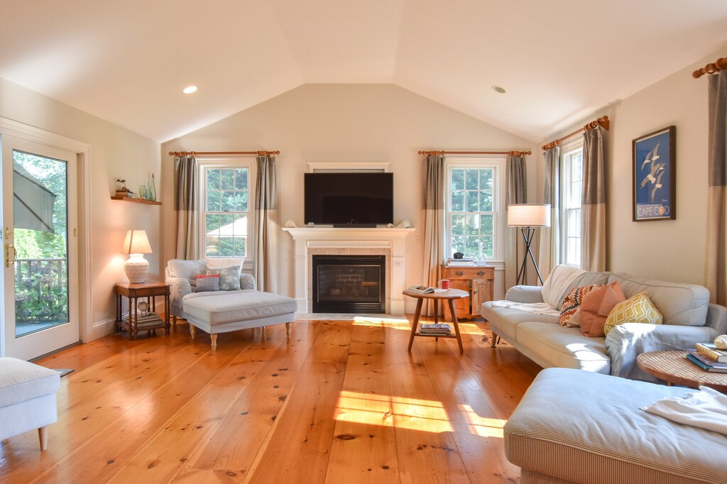 The living room with direct access to the deck and private backyard.