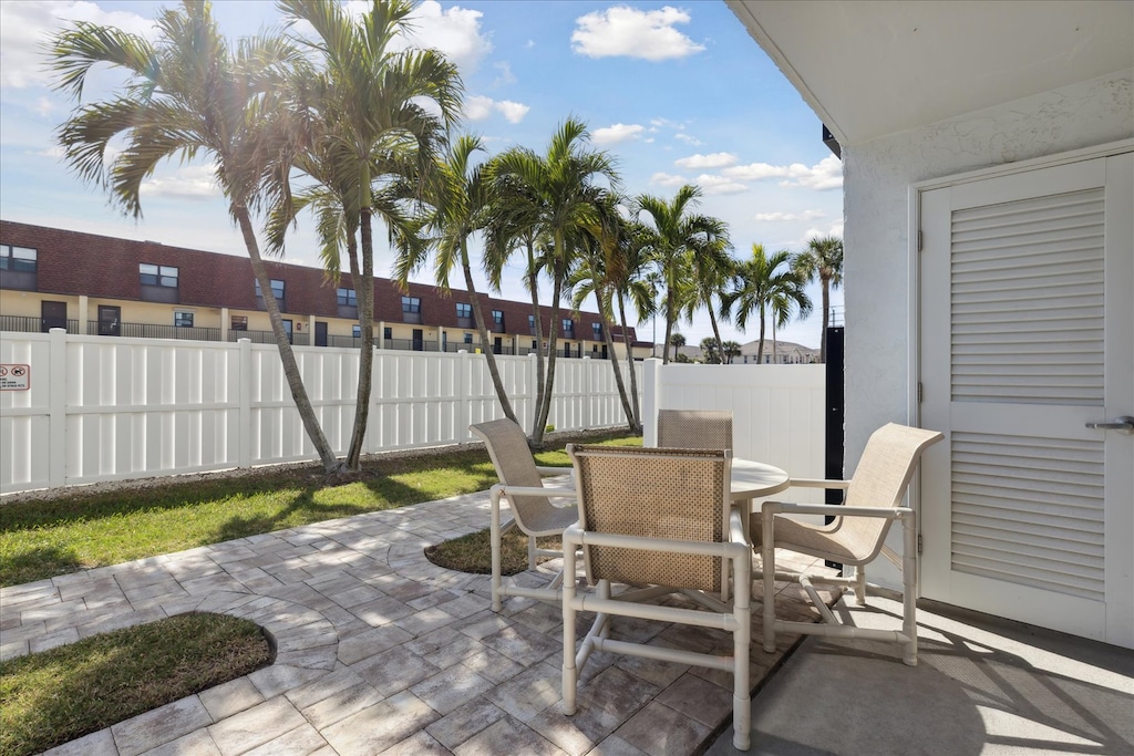 Private patio with outdoor dining setup