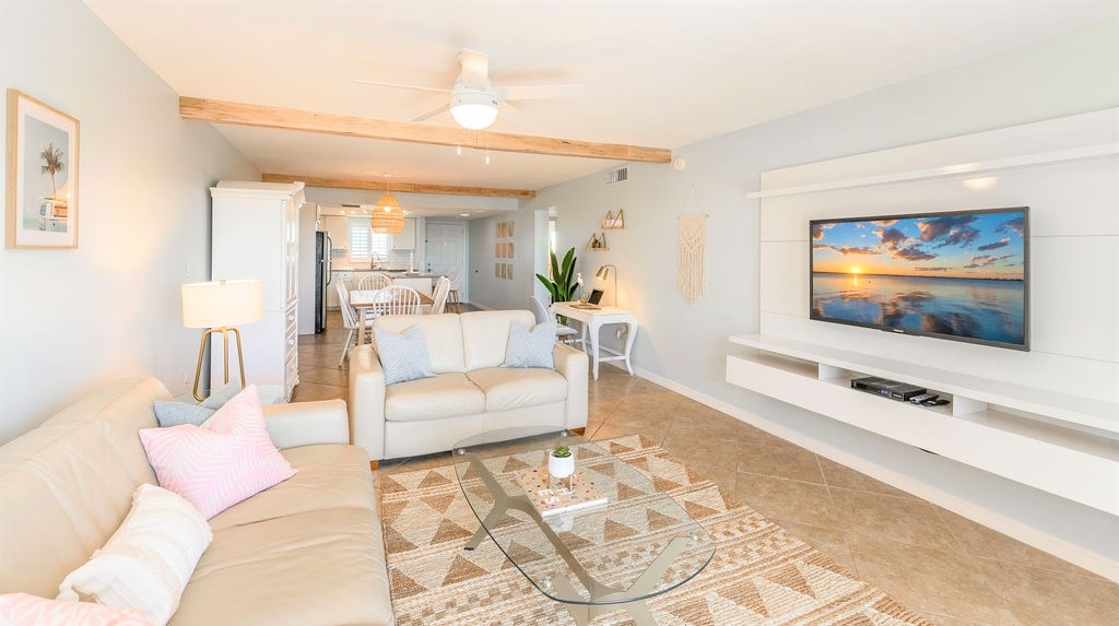 Take a refreshing dip in the large heated pool surrounded by palm trees