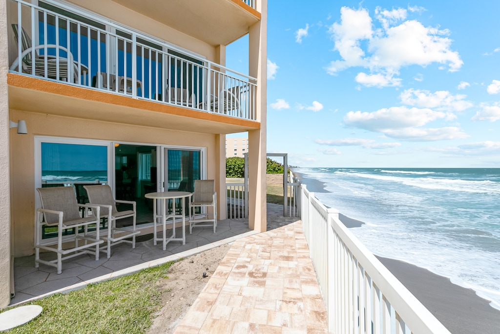 Step onto your private patio located directly on the beach