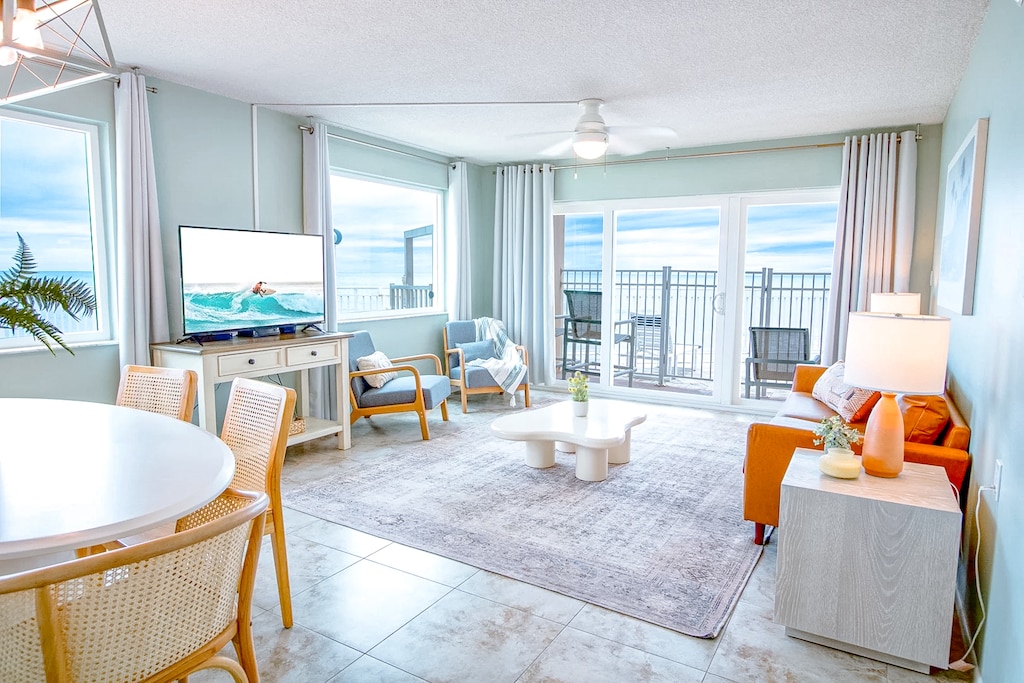 Unwind in a sunlit living space with breathtaking oceanfront views