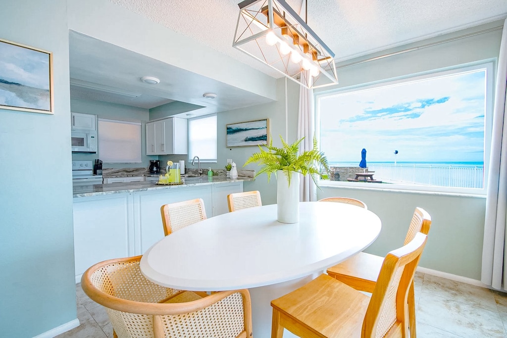 Gather around this stylish dining space that seats six