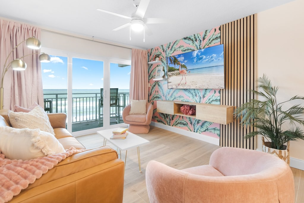 Relax in this airy ocean view living space where the waves are just a glance away