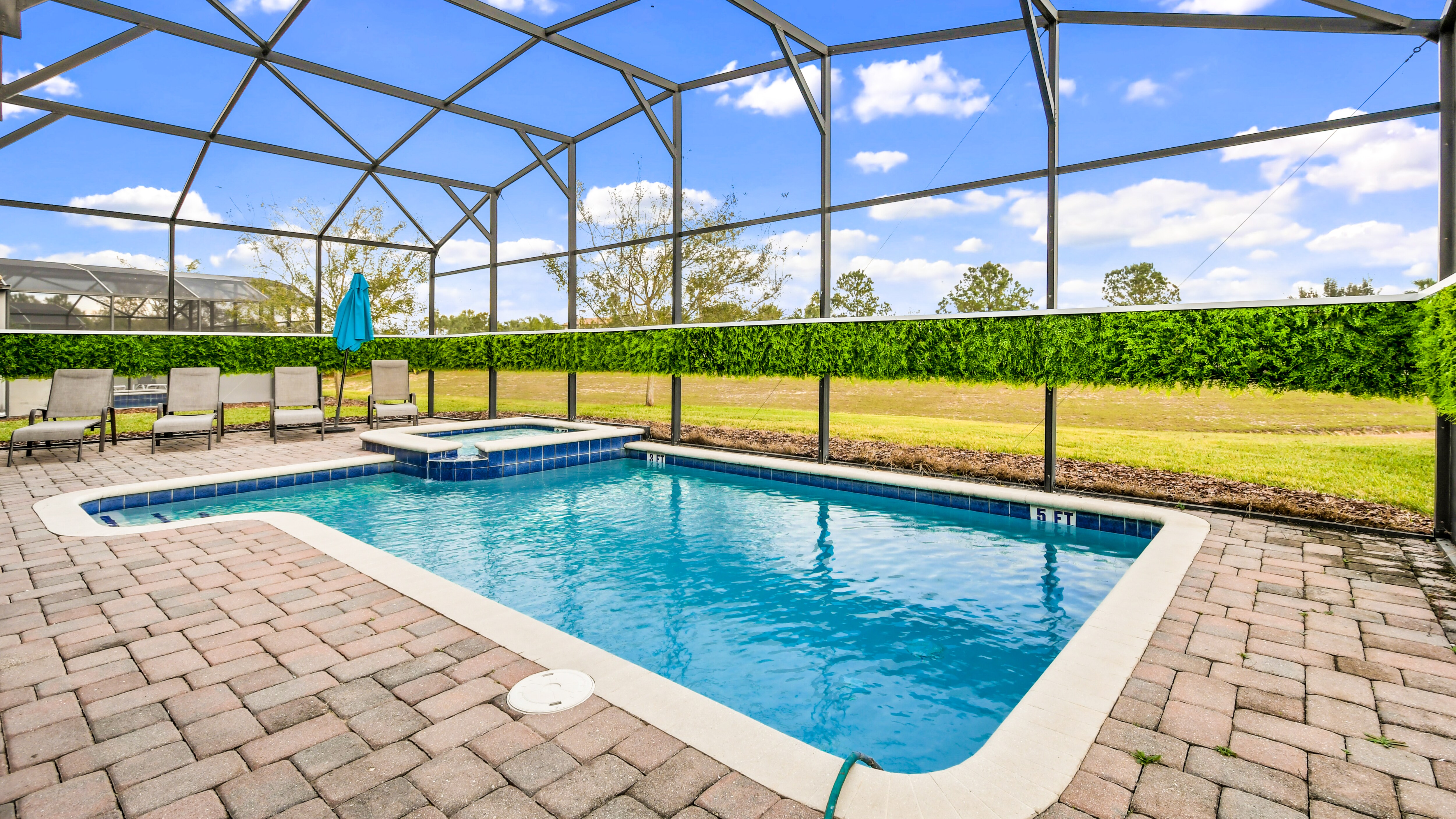 Screened outdoor pool, blending the joys of swimming with a sheltered and private oasis