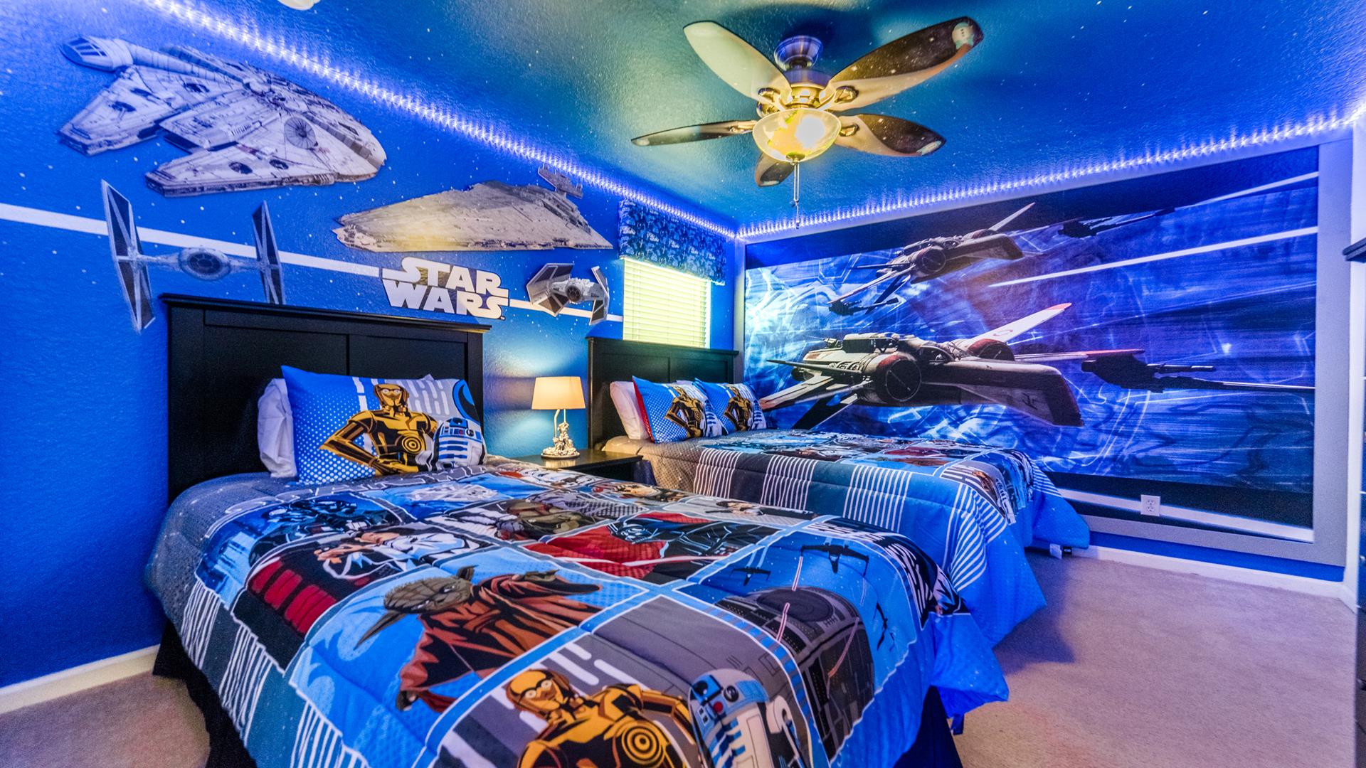 Kids will love the upstairs bedroom with a cool Star War theme