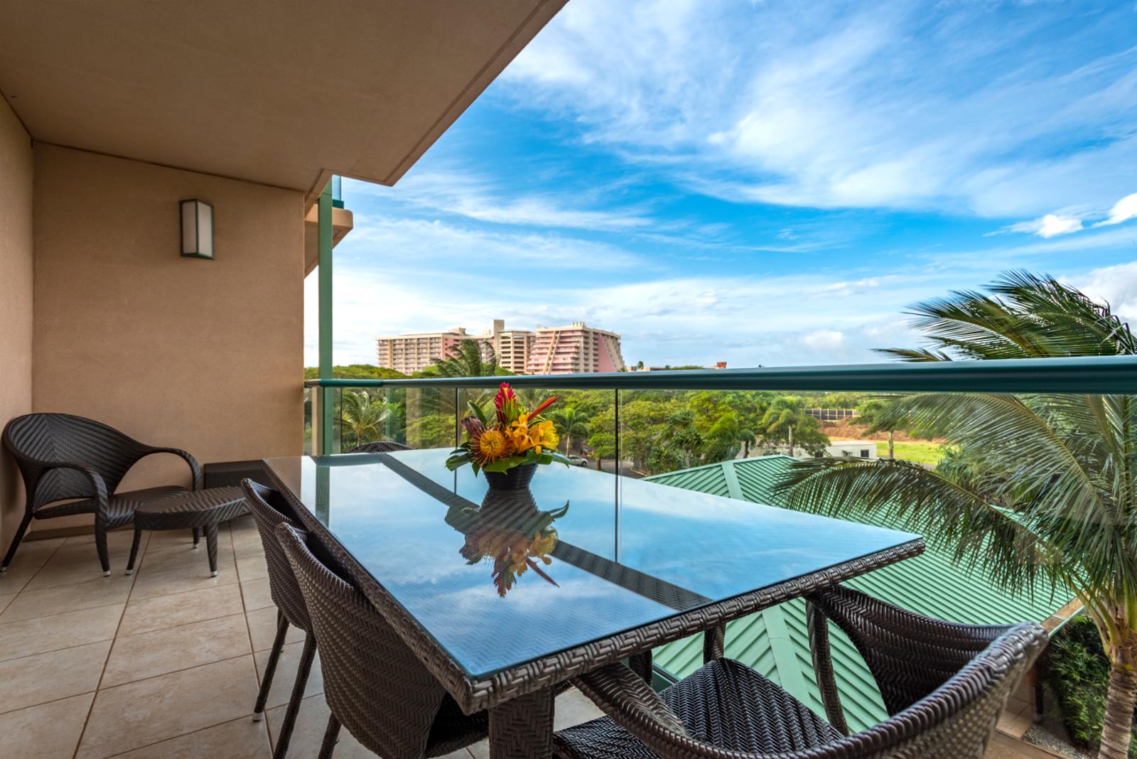 Spacious balcony with comfortable furniture - perfect for cool breezes and relaxing while on vacation!