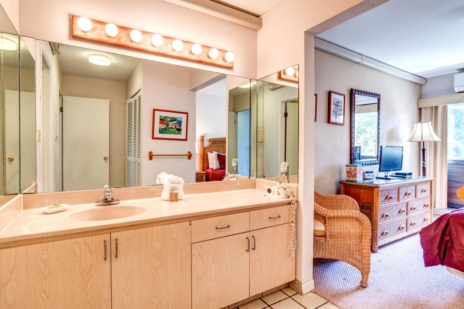 Spacious and luxurious, the master bathroom includes dual vanities, large mirrors, and soft lighting for a spa-like feel.