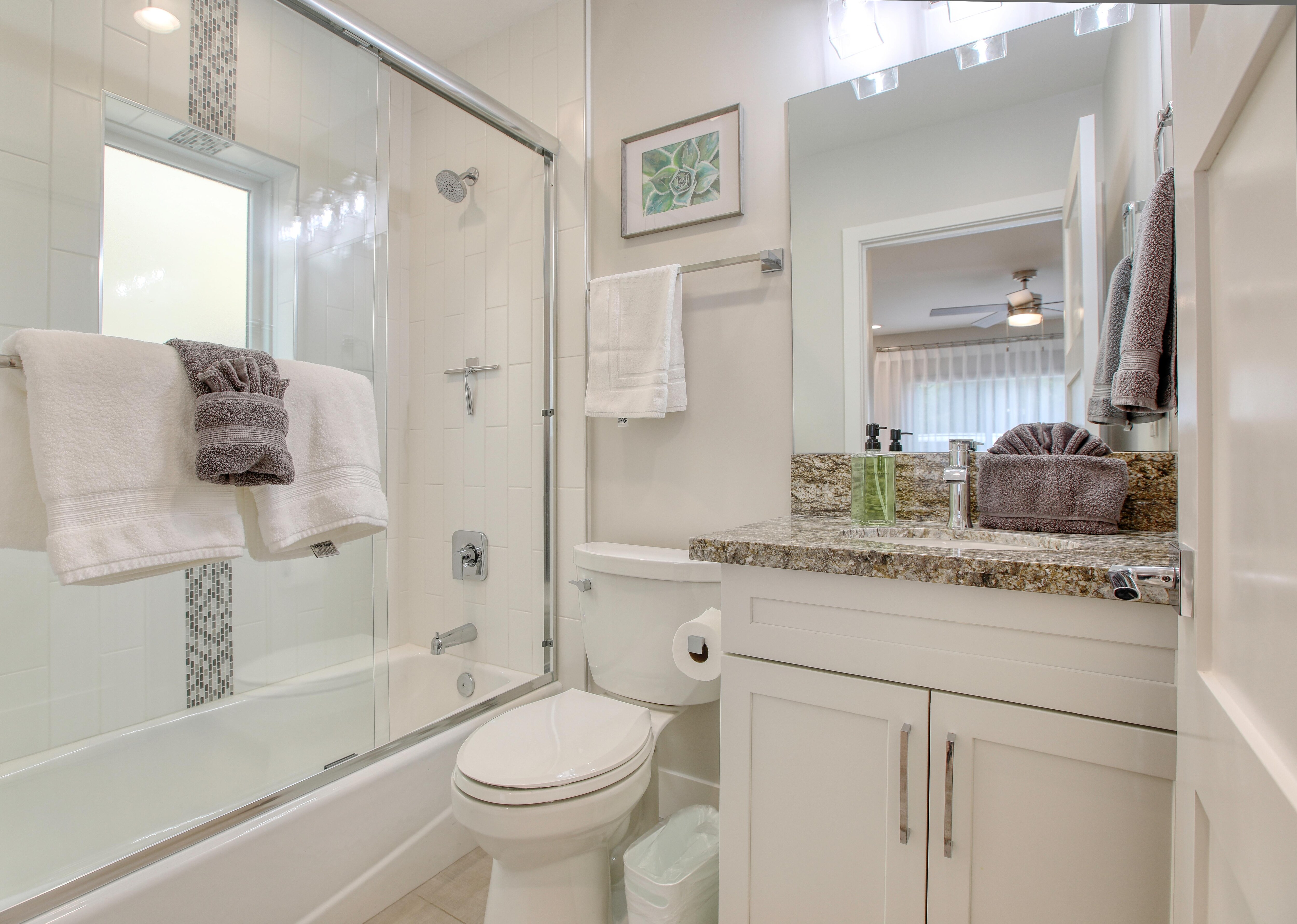The first bedroom's ensuite bathroom has a tub/shower combination