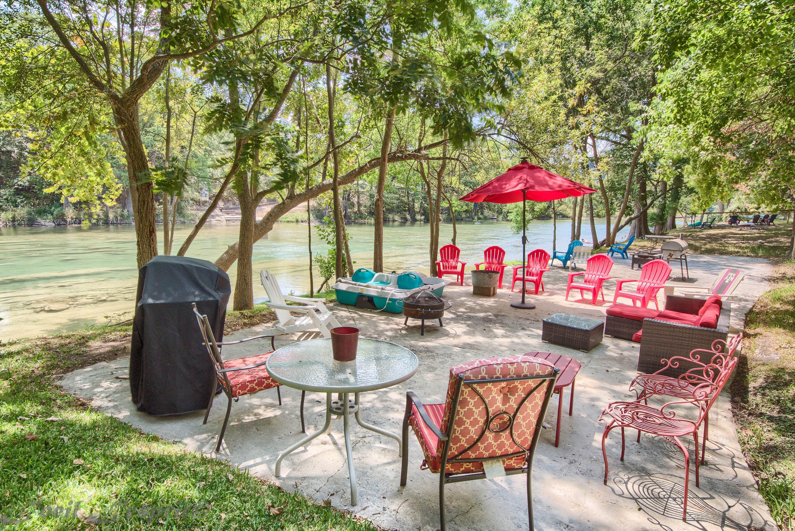  Concrete pad at the waters edge with ample seating, propane grill, and direct river access.
Paddle Boat was swept away in flood, no longer available. 
