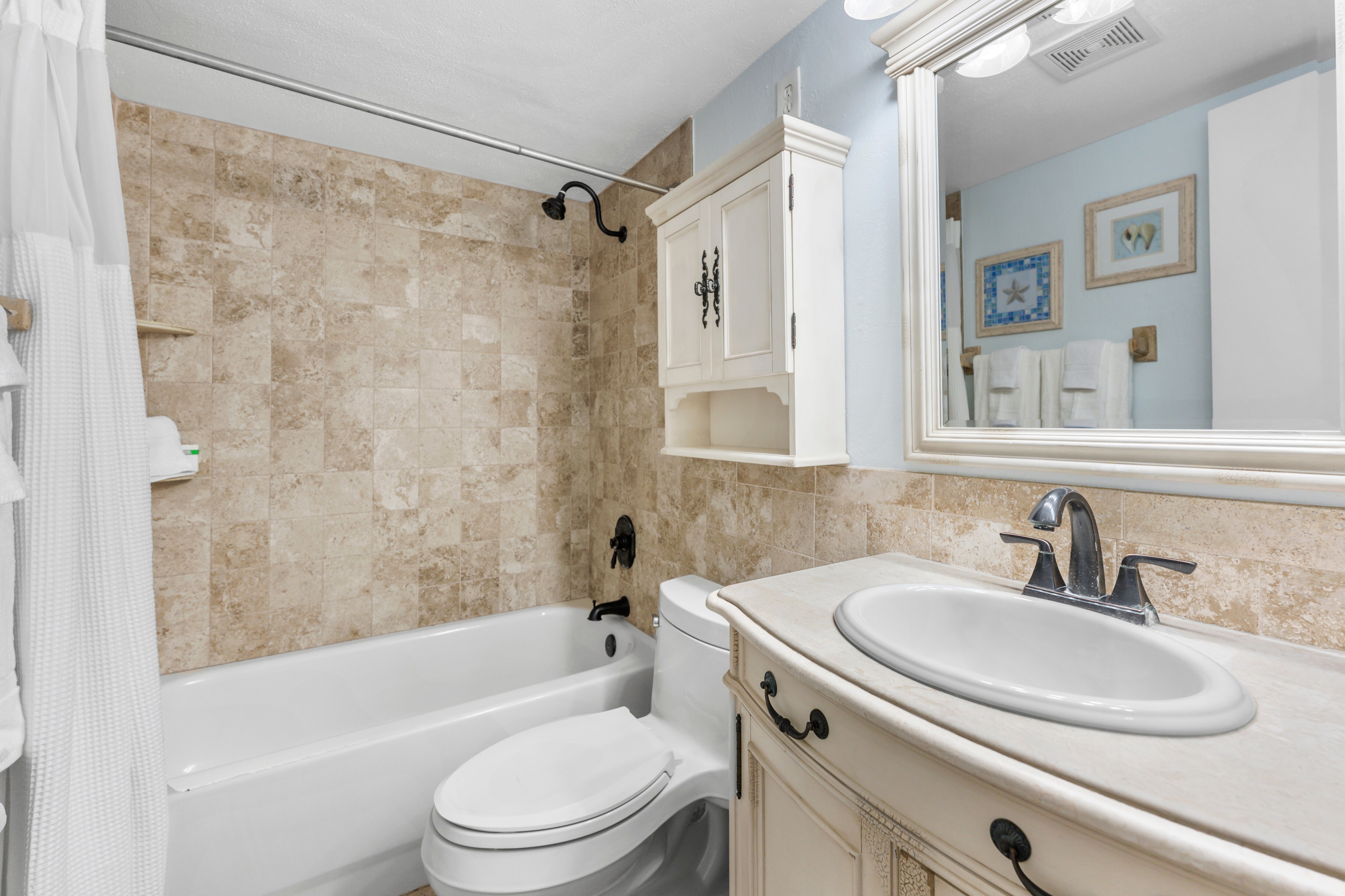 Beautifully designed bathroom featuring a tub