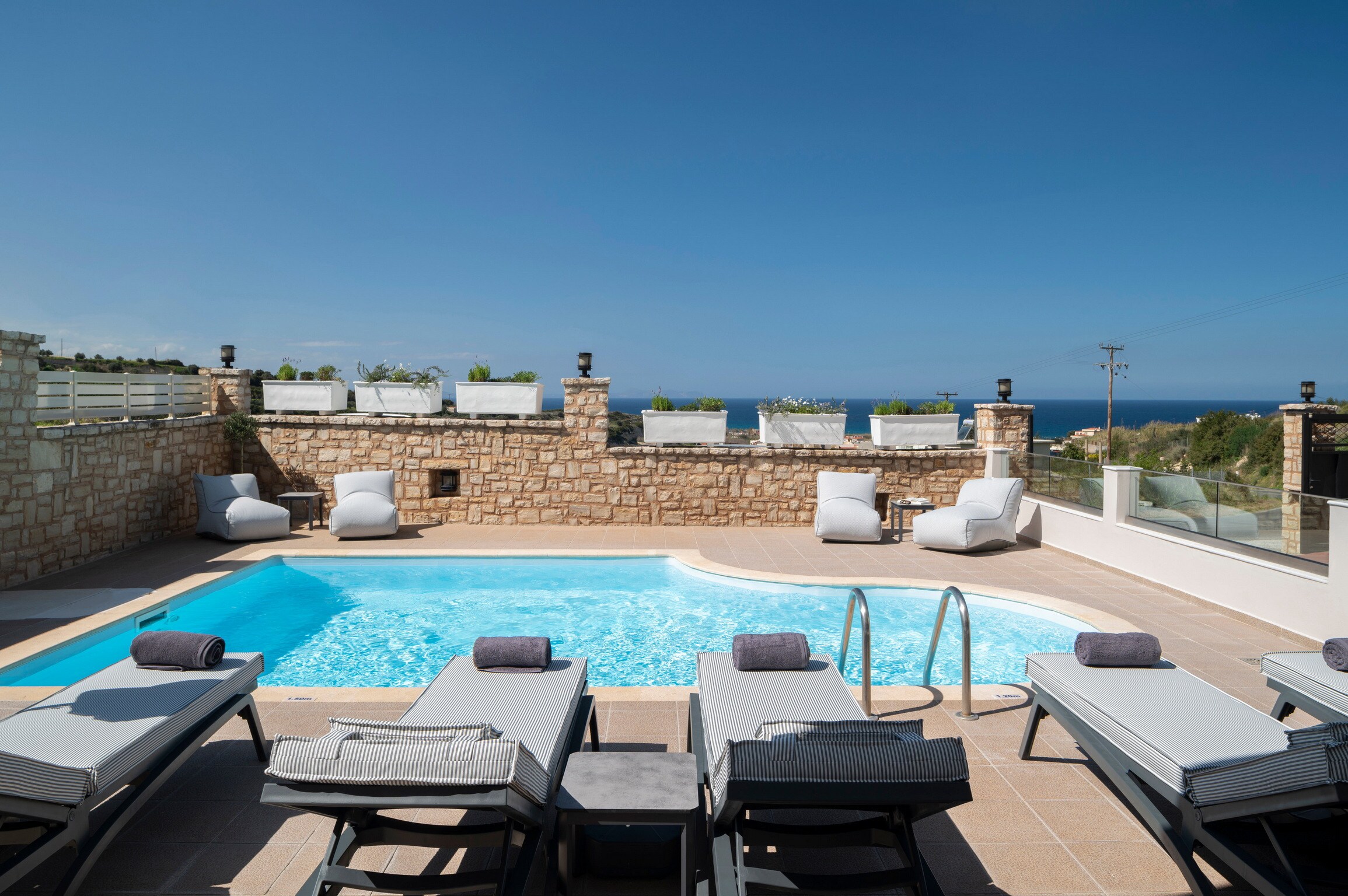 Swimming pool area of Fully equipped apartment,Shared pool,Near beach,tavern,supermarket,Nea Magnissia,Rethymno,Crete