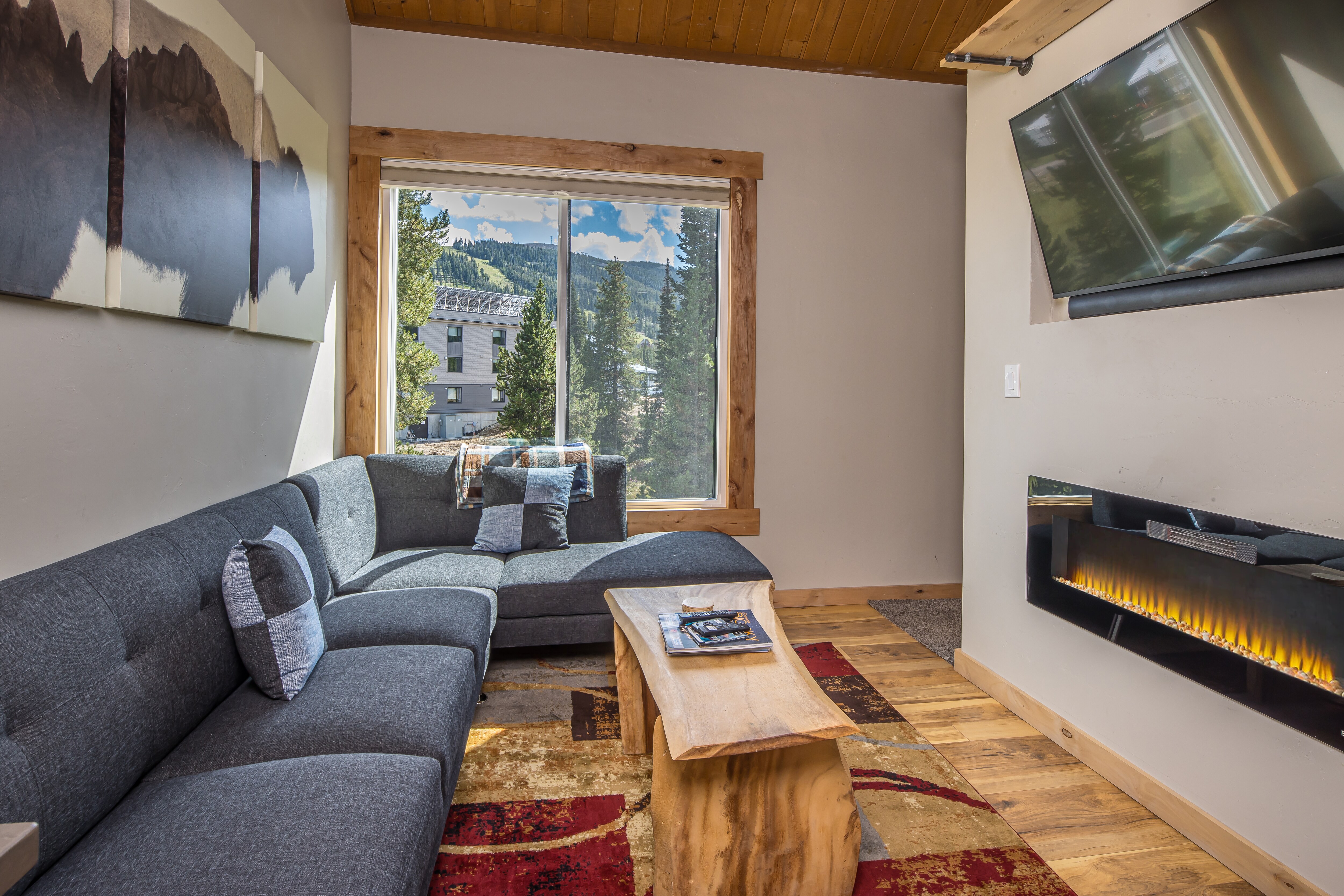 Warm up by the fire and enjoy the views | Main Level