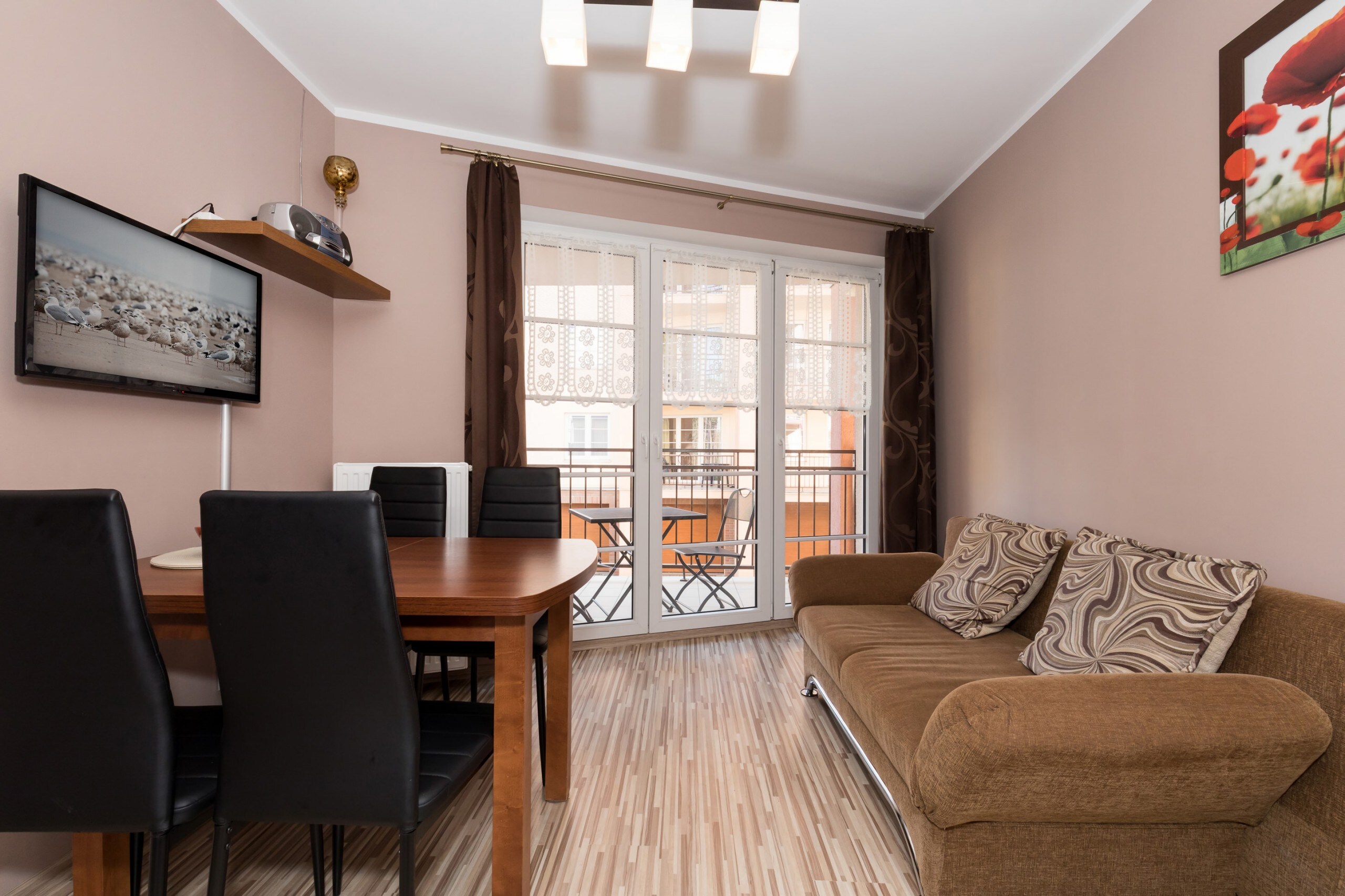 Living room of Villa Park 17/1 with sofa, tv and dining area