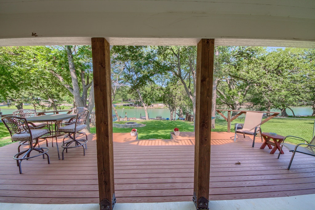 Beautiful view of the backyard, with a nice deck seating area. 