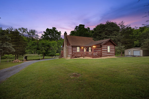 Property Image 1 - Riverfront Log Home, Kayaks, Firepit, Hot Tub