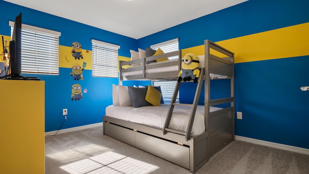 Adorable Minion-Themed bedroom with a twin on top and full bed on the bottom and a flat screen TV (Sleeps 3)