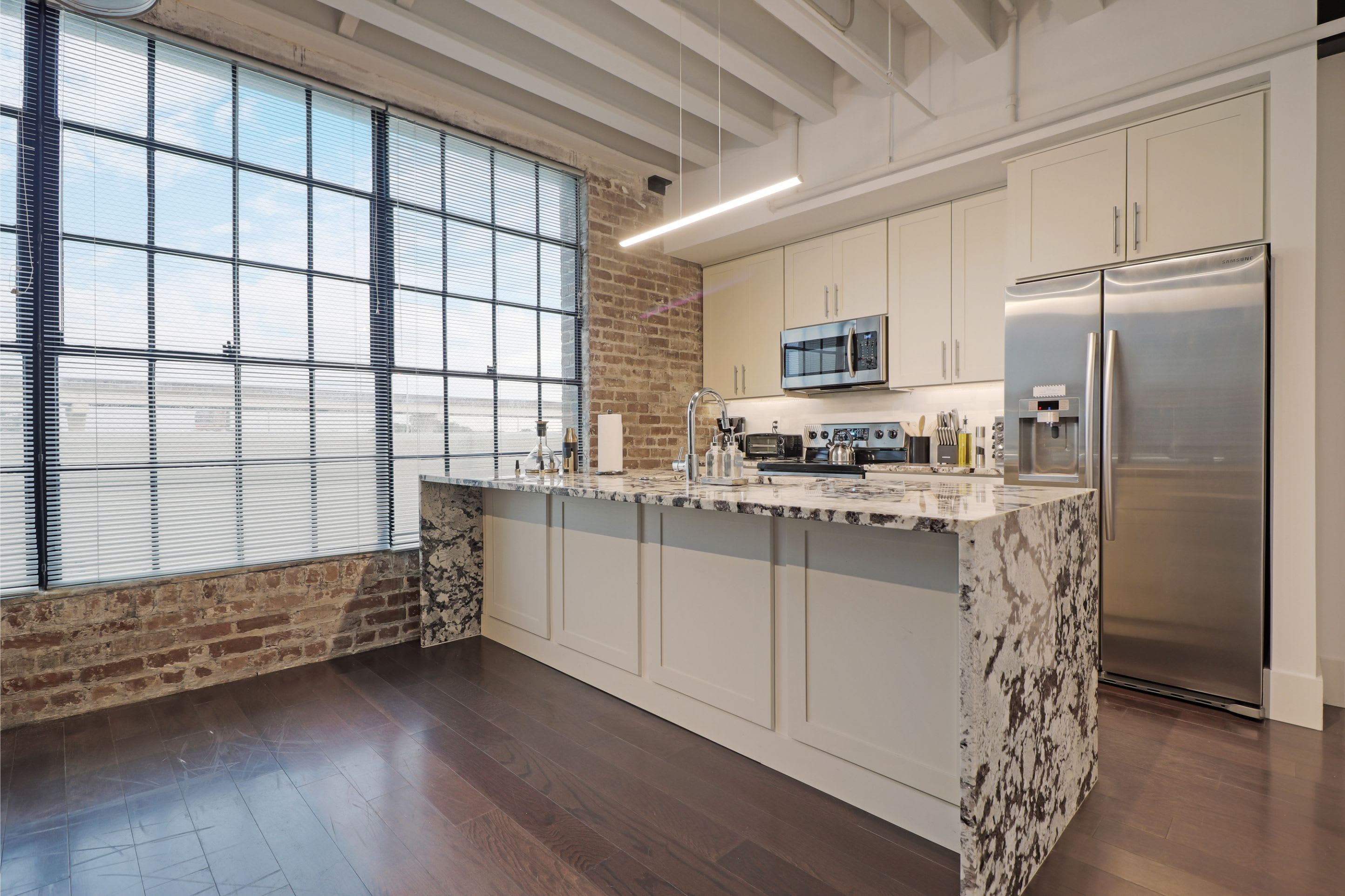 Property Image 2 - Motorworks | 5 minute drive to Bourbon St | Penthouse | Balcony | 2 Bed 2 Bath