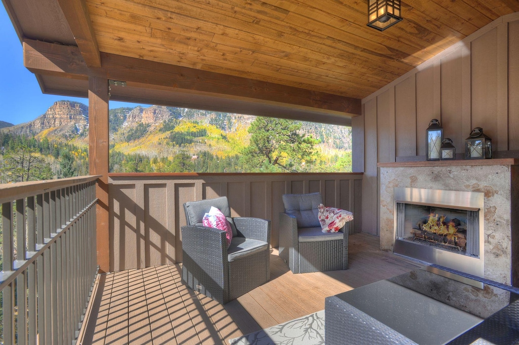 Covered deck with Gas Fireplace and views of Castlerock