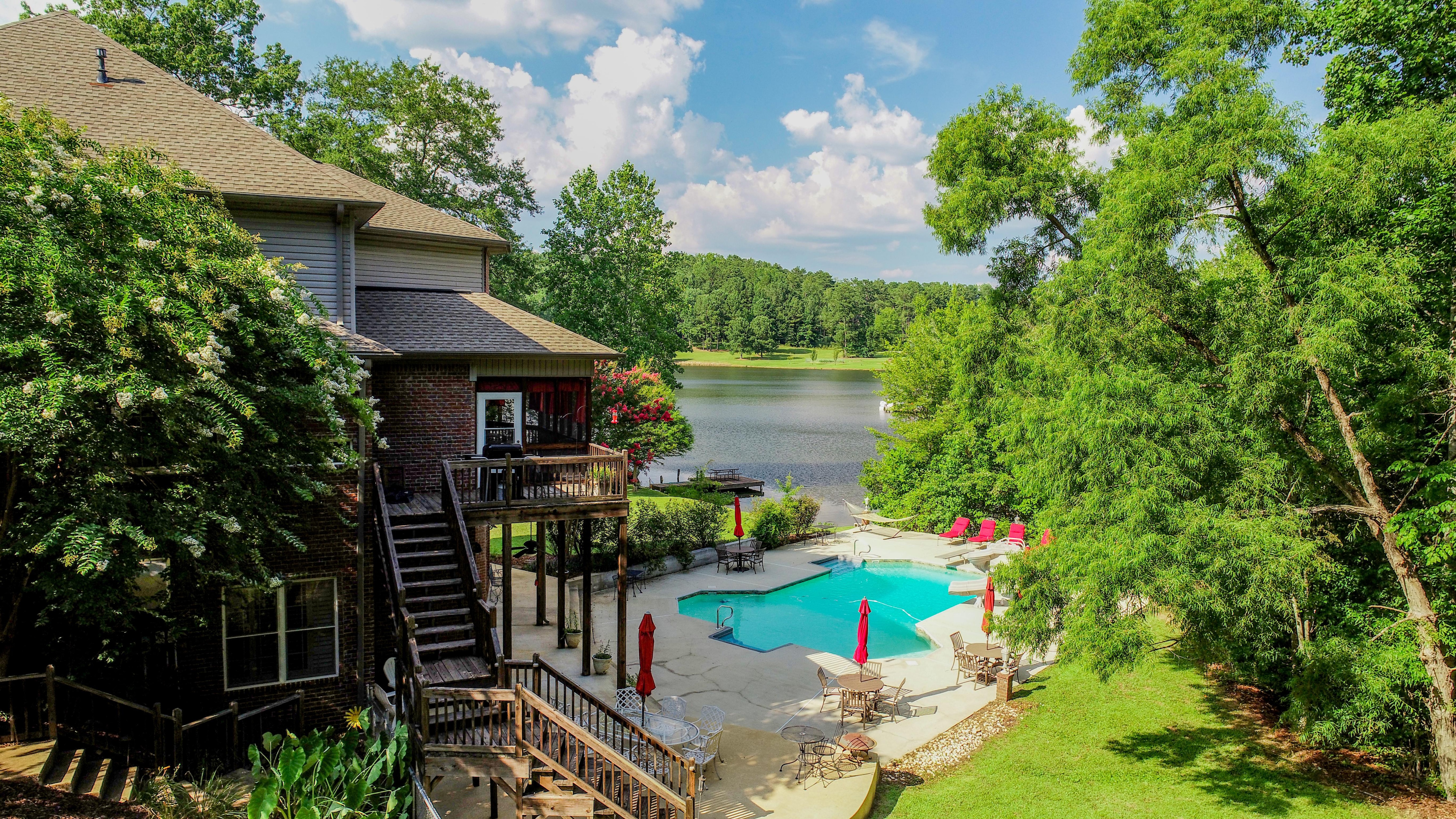 Bama Lakeside Retreat has a beautiful outdoor space including a heated pool.