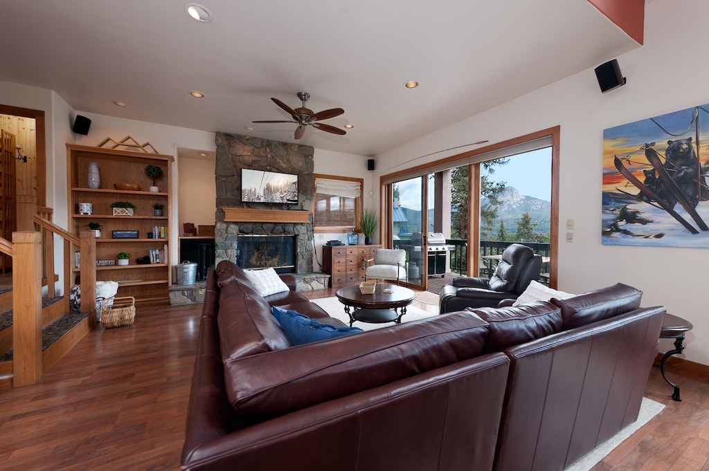 Main Living Space with mountain views, covered deck with  BBQ. Ceiling fan, TV, and wood burning fireplace (wood provided)