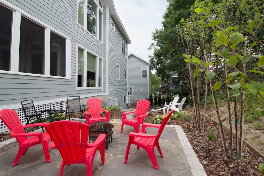 Another view of the fireplace area at Catchin Some Rays.  Beautifully landscaped with party lights strung about for an evening outdoors.